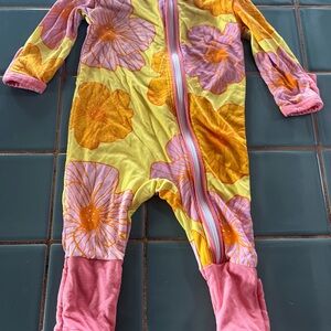 Vibrant Yellow and Pink Bodysuit with Artistic Design